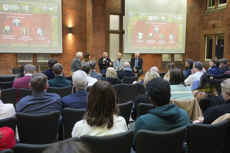 Attentive audience listening to panel discussion